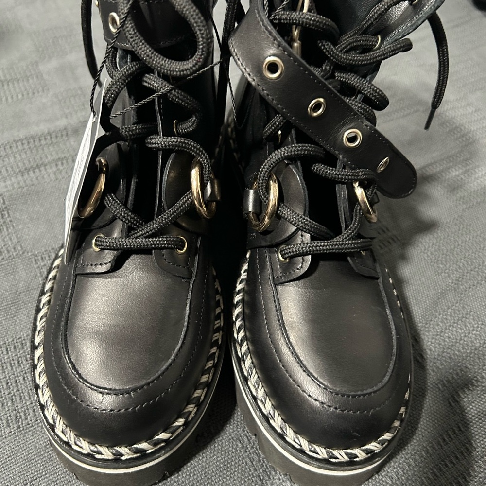 NIB $679 AGL Leather buckled boots Black